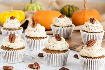 Pumpkin Spice Cupcakes. These delicious, warming pumpkin cupcakes are so light and fluffy, and are topped with the most incredible maple pecan buttercream! A perfect autumnal bake! Recipe by movers and bakers #pumpkinspicecupcakes #pumpkinspice #autumnbaking #pumpkincupcakes