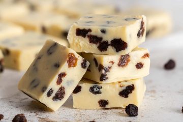 Rum and raisin fudge. A deliciously indulgent quick fudge recipe which comes together in minutes and makes a wonderfully boozy edible gift! Recipe by movers and bakers
