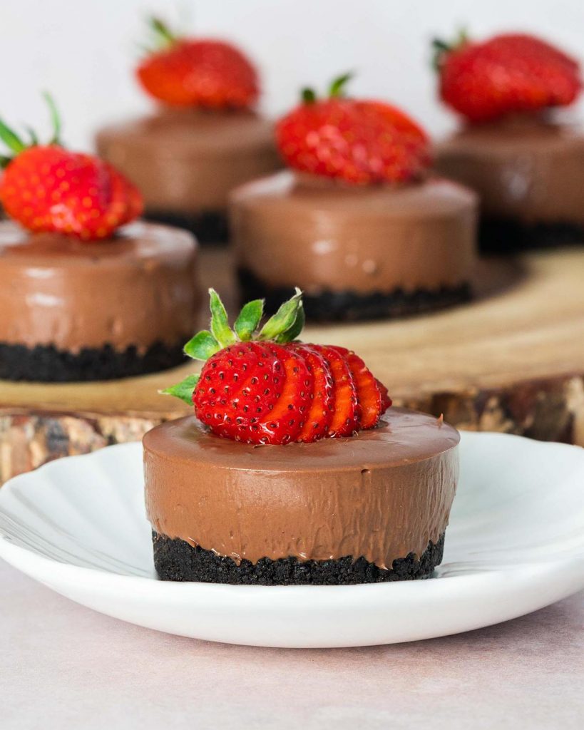 Chocolate strawberry cheesecake. A silky smooth chocolate cheesecake conceals a hidden surprise strawberry middle in these delightful mini no bake cheesecakes! Recipe by movers and bakers