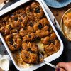 Hot cross bun bread and butter pudding. A mashup recipe featuring yummy Easter buns and a delicious orange spiced custard baked until divine and totally irresistible! Recipe by movers and bakers