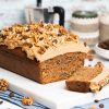 Coffee and walnut loaf. A wonderfully rich coffee flavoured cake, studded with walnuts is topped with a perfectly sweet coffee frosting and a generous sprinkling of walnuts to finish. Heavenly coffee cake! Recipe by movers and bakers